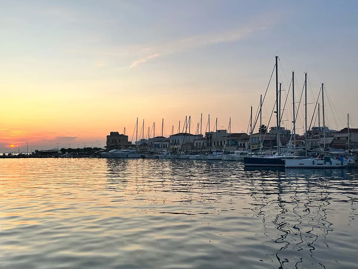 Sunset over a Greek island marina